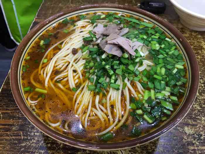 韩记牛肉拉面-"现在上了铜锅涮羊肉,我们三个人要了三分羊.