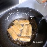 老妈做的是上海风味的豆腐衣包肉