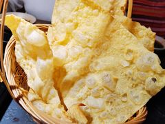 -老牌坊云南鱼豆花火锅(哈西万达店)