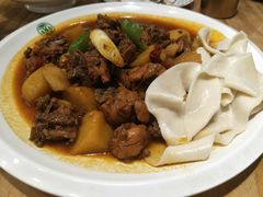 沙湾大盘鸡-塔哈尔·新疆盛宴(城西银泰店)