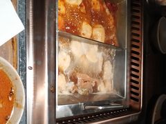 -老牌坊云南鱼豆花火锅(哈西万达店)