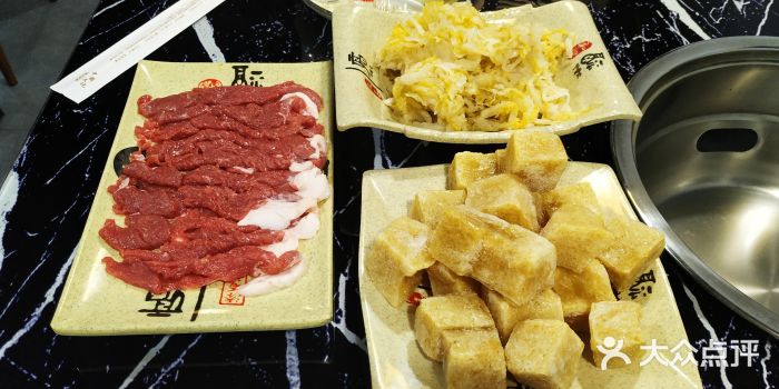 牛九铜火锅图片