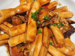 梭子蟹炒年糕-卯时·龙光雅宴·精致锡帮菜(惠山古镇店)