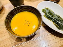 现熬南瓜粥-泥炉烧肉师(新街口金銮巷店)