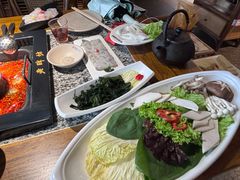 -老牌坊云南鱼豆花火锅(哈西万达店)
