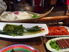 -老牌坊云南鱼豆花火锅(哈西万达店)