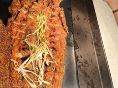 -明何记涮牛肚(品牌首店隋唐植物园南门古城路店)