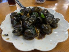 紫苏酸笋鼓汁炒田螺-南记食粥坊·宵夜大排档(南桂店)
