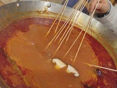 -拈签一笑黄牛肉辣卤串串