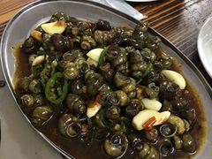 炒田螺-广宁炭炉鸡煲·富临门饭店