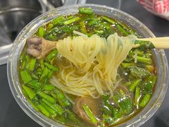 -梁老三麻辣鸡头总店