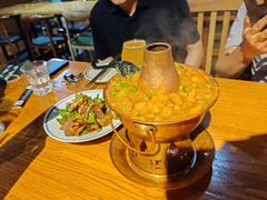 焖锅鸡-蜗牛的家旅行主题云南菜餐厅.小酒馆(护国寺店)