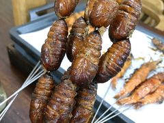 烤蚕蛹-大院涮烤·东北经典老味烧烤·铜锅涮肉(江南东路店)