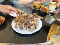 -周老三跷脚牛肉·全牛火锅(非遗传承店)