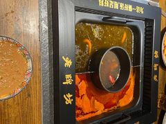 -老牌坊云南鱼豆花火锅(哈西万达店)