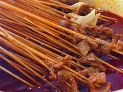-拈签一笑黄牛肉辣卤串串
