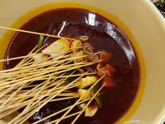 -拈签一笑黄牛肉辣卤串串