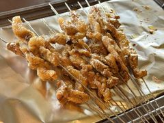 -曼听小寨海鲜烧烤·大连辣炒大王(盖州街店)