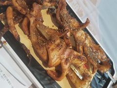 烤鲜鱿鱼-大锅强·蒸海鲜青岛菜(金沙滩店)