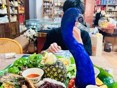 -沐毫傣泐云南菜孔雀宴•手抓饭傣味烧烤(曼听公园店)