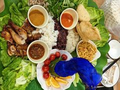 -沐毫傣泐云南菜孔雀宴•手抓饭傣味烧烤(曼听公园店)