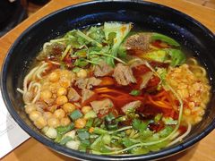 -爆炸头阿姨小四川正宗川味小吃(无任何分店)