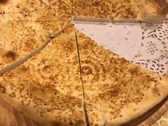 馕坑芝麻馕-巴扎美食·新疆菜·西域歌舞表演餐厅(新疆大厦店)