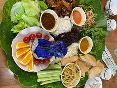 -沐毫傣泐云南菜孔雀宴•手抓饭傣味烧烤(曼听公园店)