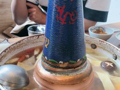 -毛辣果·贵州红酸汤牛肉火锅(西单店)