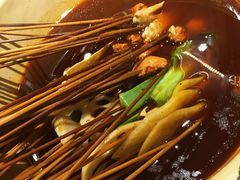 -拈签一笑黄牛肉辣卤串串