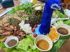-沐毫傣泐云南菜孔雀宴•手抓饭傣味烧烤(曼听公园店)