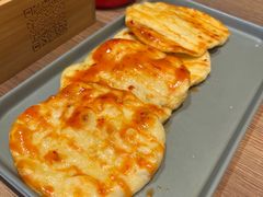 烤肇东小饼-街角等你.大连海鲜烧烤.经典铁板海鲜串(西安路店)