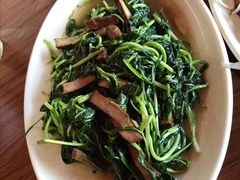 香干炒马兰头-唔呶喔哩酒家(生产街店)