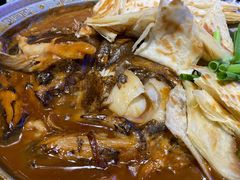 鲽鱼头泡饼-渔民船说·北塘海鲜·天津菜·海肠捞饭(北塘古镇店)