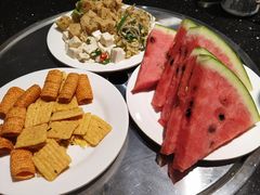 -明何记涮牛肚(品牌首店隋唐植物园南门古城路店)
