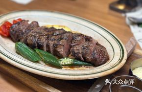 Charcoal Grilled 150-Day Grain-Fed Ribeye Steak