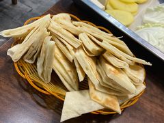 泡饼-超越炭火牛蛙火锅鸡(河东店)