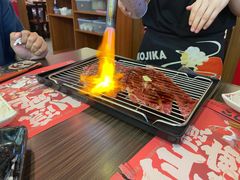铺天盖地火牛寿司（2枚）-仙隐小鹿中华料理(南宁万象城店)
