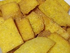 锅巴玉米饼-正宗东北木火铁锅炖鱼村