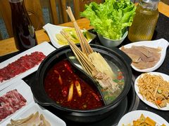 -明何记涮牛肚(品牌首店隋唐植物园南门古城路店)