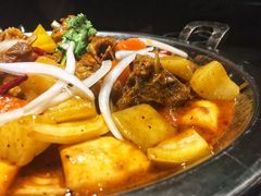 馕坑肉-游牧传奇新疆特色歌舞餐厅(红山新世纪购物广场店)