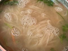 狗肉汤热面-春花民族美食(佳木斯总店)