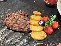 厚切澳洲谷饲安格斯肉眼-蜜悦·波西塔诺悬崖海景餐厅