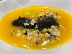 有机小米煨辽参-臻宝中餐厅·大连菜·海鲜·融合菜(大连一方城堡豪华精选酒店)