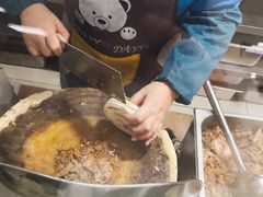 手工现场切馍-樊记腊汁肉(竹笆市总店)