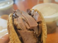 烧饼夹肘子肉-老四烧饼铺(丽源路店)