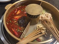 -明何记涮牛肚(品牌首店隋唐植物园南门古城路店)