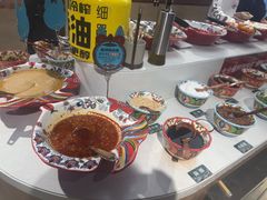 -老牌坊云南鱼豆花火锅(哈西万达店)