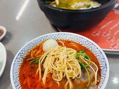 酸辣牛肉过桥米线-妈妈故事米线(市府恒隆店)