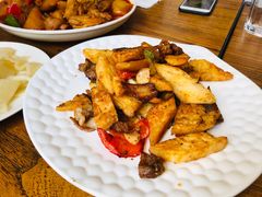 家乡馕炒肉-阿里家·新疆烤肉酒場 by MIG